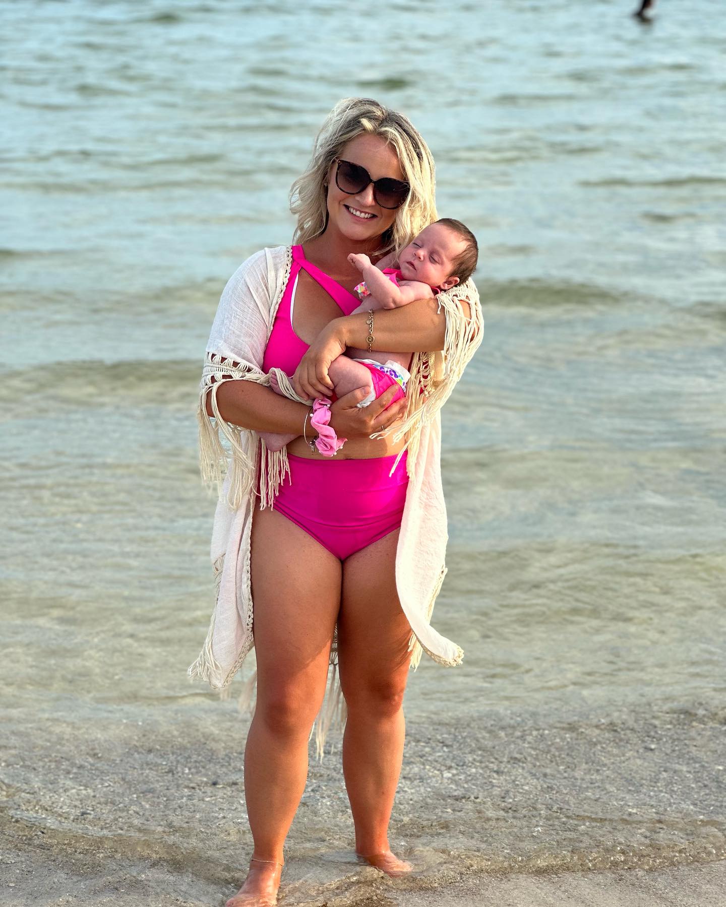 Deirdre Looney, founder of Chaos & Courage, with her baby at the beach